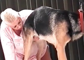 Short-haired zoophile blows a mutt