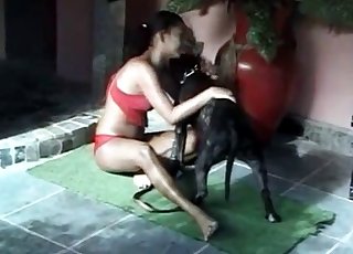 Ebony zoophile is toying with a farm brute