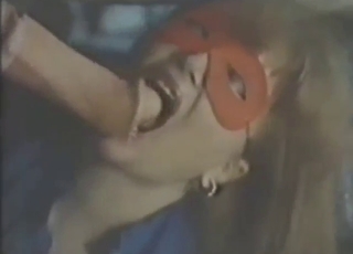 Red mask hottie gets fucked by a hung horse